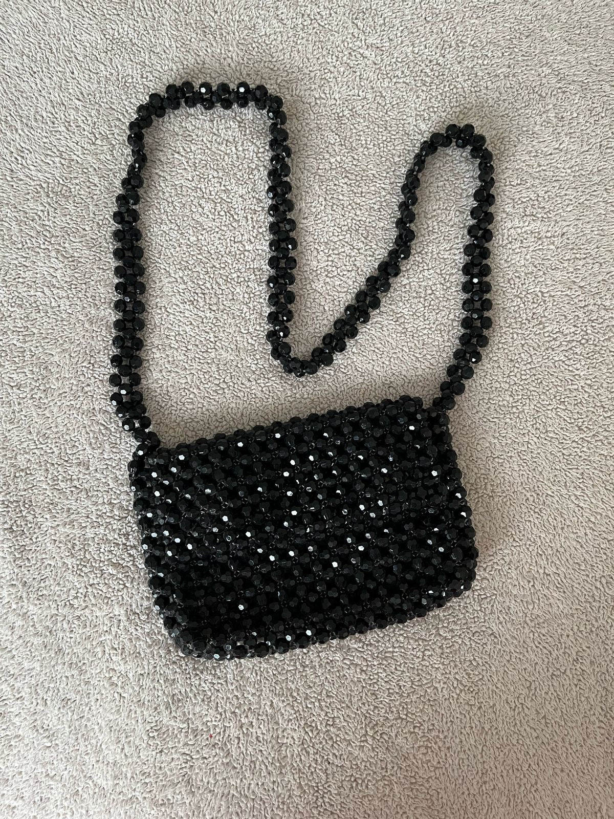 Cartera de cuentas pedrería negra