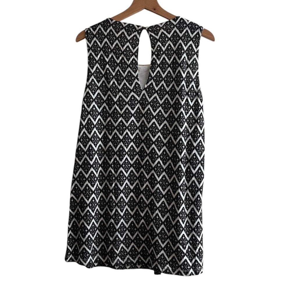 Blusa blanca y negra con aplicación en el cuello H&M - Talla M