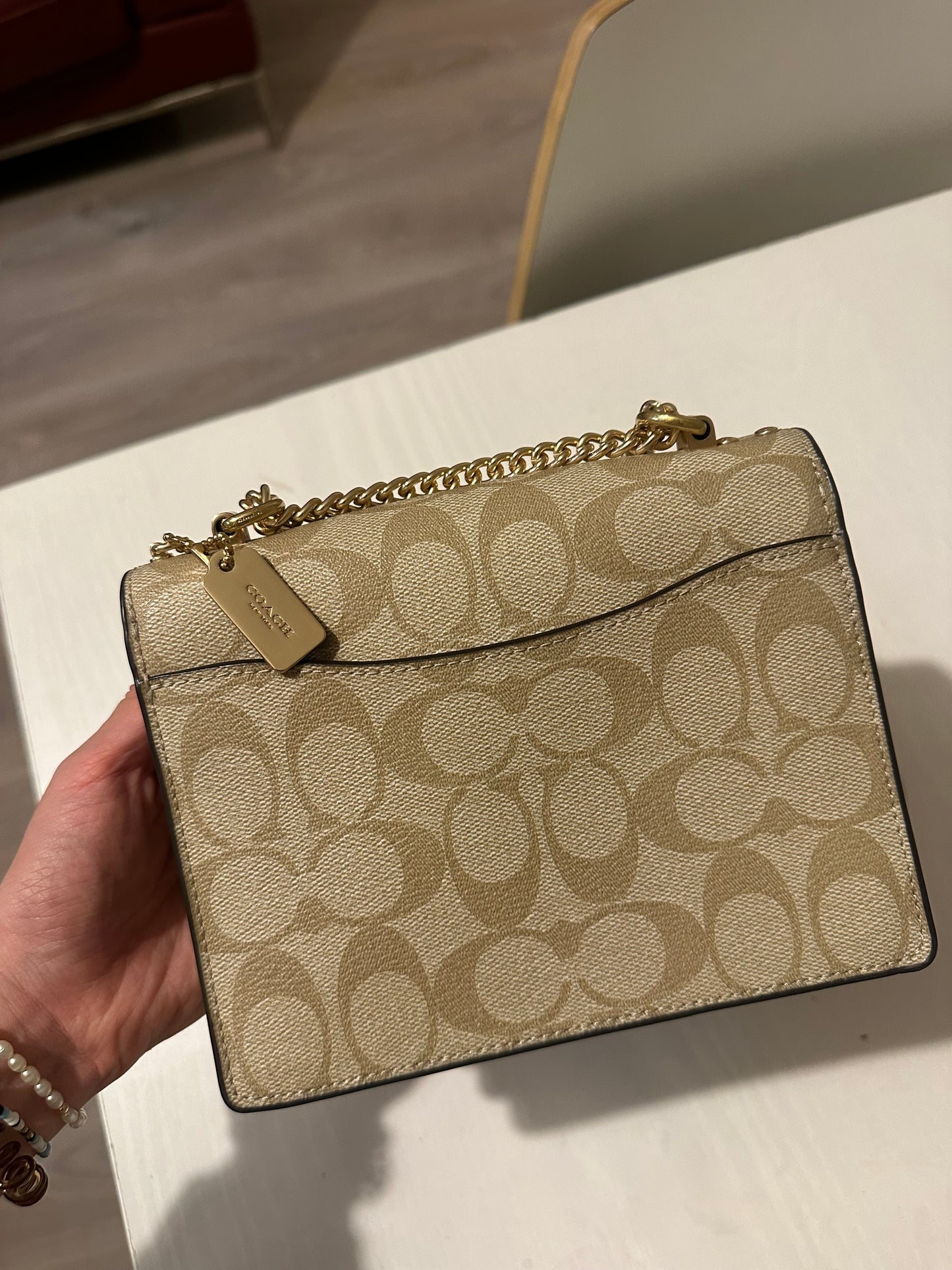 Cartera beige de cuero coach